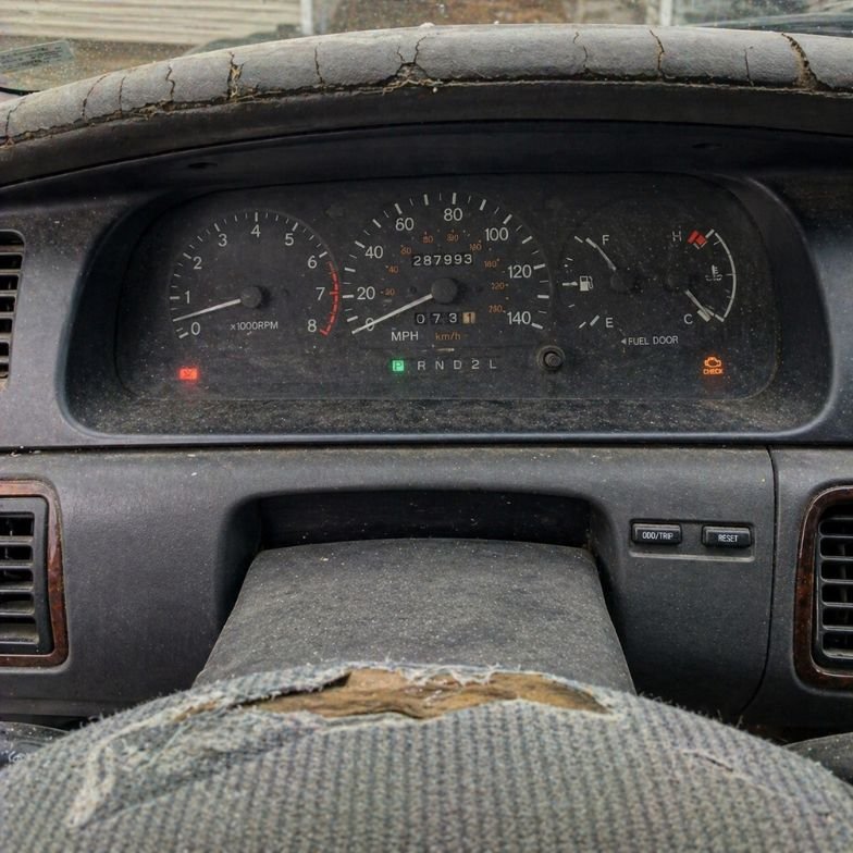 Dashboard odometer interior photo for accurate junk car quote