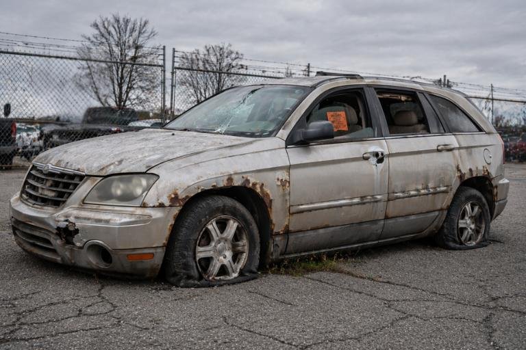 Abandoned junk car sitting in a Wisconsin yard